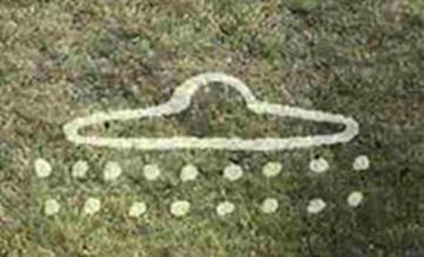 mo-ta-ufo Hình ảnh được cho là mô tả UFO trong một bức tranh hang động thời tiền sử.